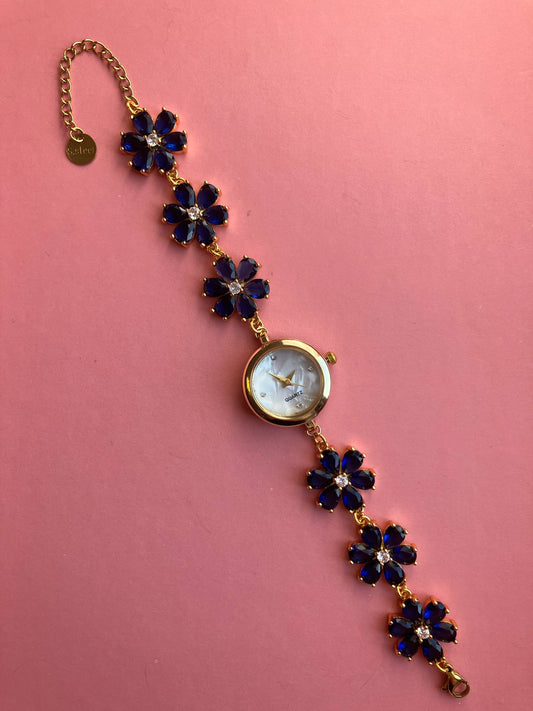 Gold Flower Watch with Dark Blue Stones