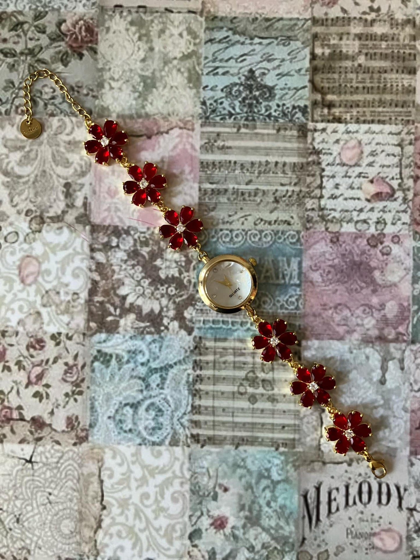 Gold Flower Watch with Red Stones