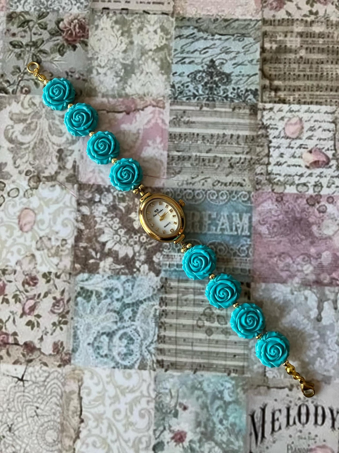 Gold Flower Watch with Blue Gemstone Roses