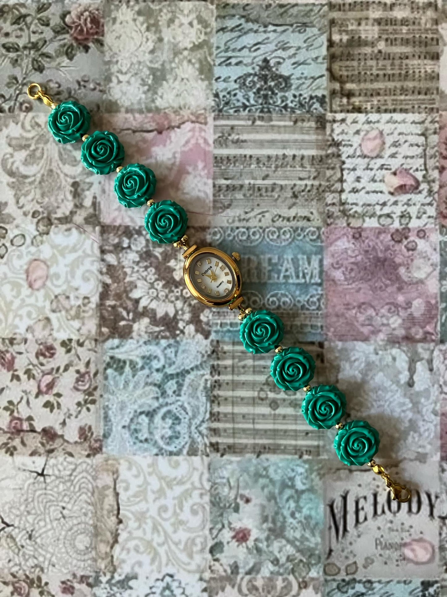 Gold Flower Watch with Green Gemstone Roses