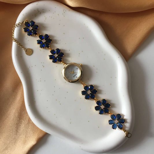 Gold Flower Watch with Dark Blue Stones